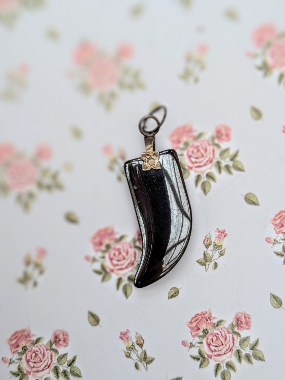 Vintage Hematite 'Bear Tooth' Pendant with Gold Tone Floral Detail